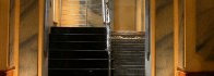 SPA & Wellness Design with diverse Marbles - Häckers hotel - Entrance stairs to the spa with granite Porto Rose.jpg
